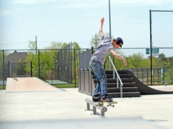 skater skateboarding doing a smith at drake skate park in west bloomfield michigan Photography