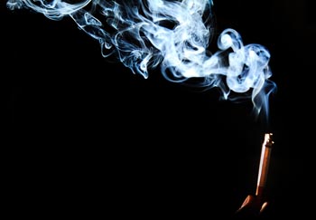 birning cigarette smoke flash photography